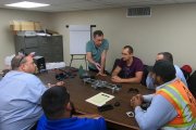 Getting acknowledged with the rail welds scanner USR-01 structure — engineers of OKOndt Group train the USA specialists during the on-site training in September 2019, Miami