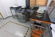 Extended table as a part of the automated aircraft wheels testing system SmartScan produced by OKOndt Group and a wheels lifting trolley which is included into the supply set upon customer's request 